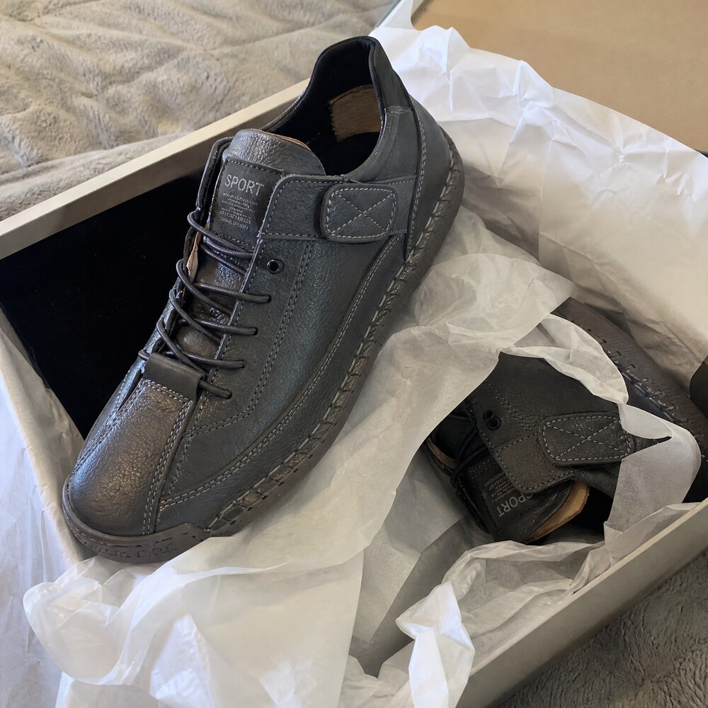 Customer unboxing grey Rosie's Easy Steps sneakers